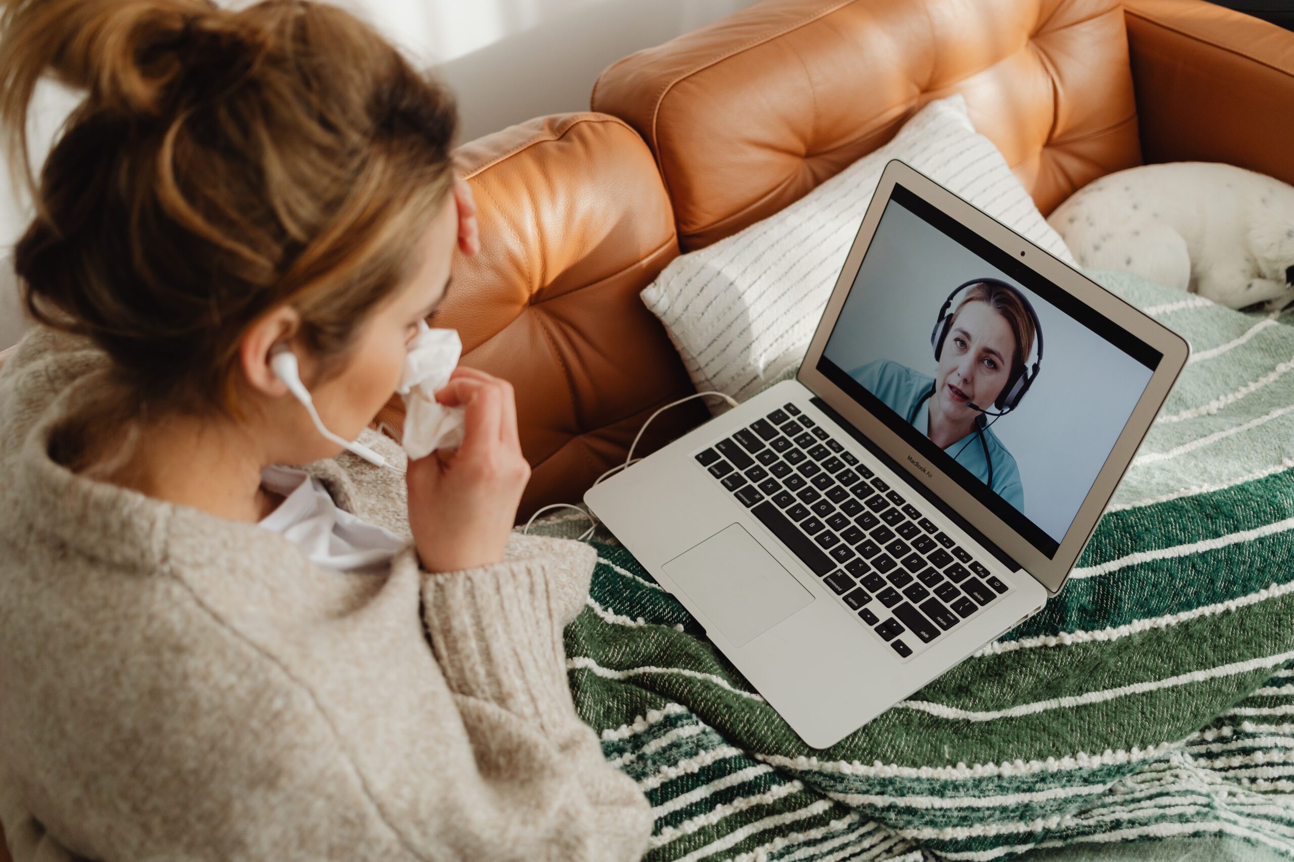 Woman on a telehealth video call with her doctor from home, showing Direct Primary Care access for Jefferson County, WV families